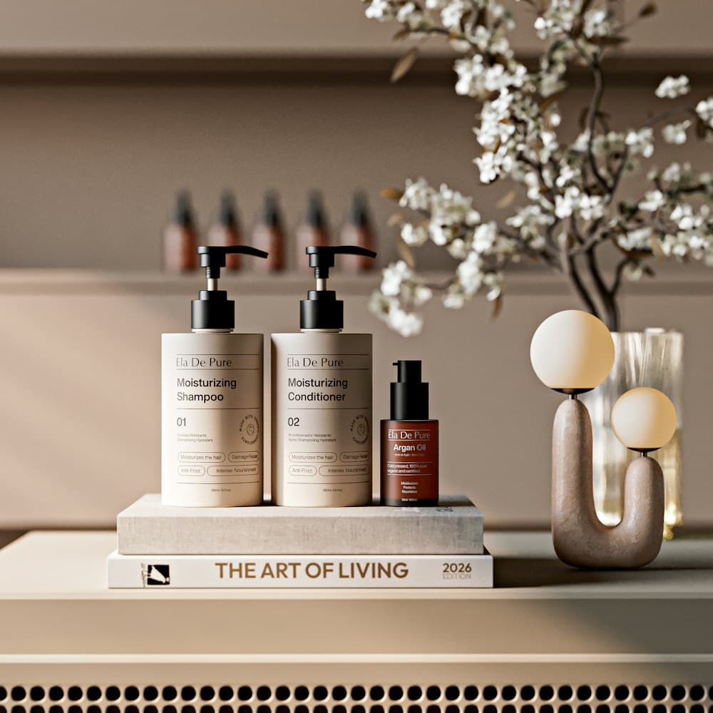 Skincare bottles beside dried flowers